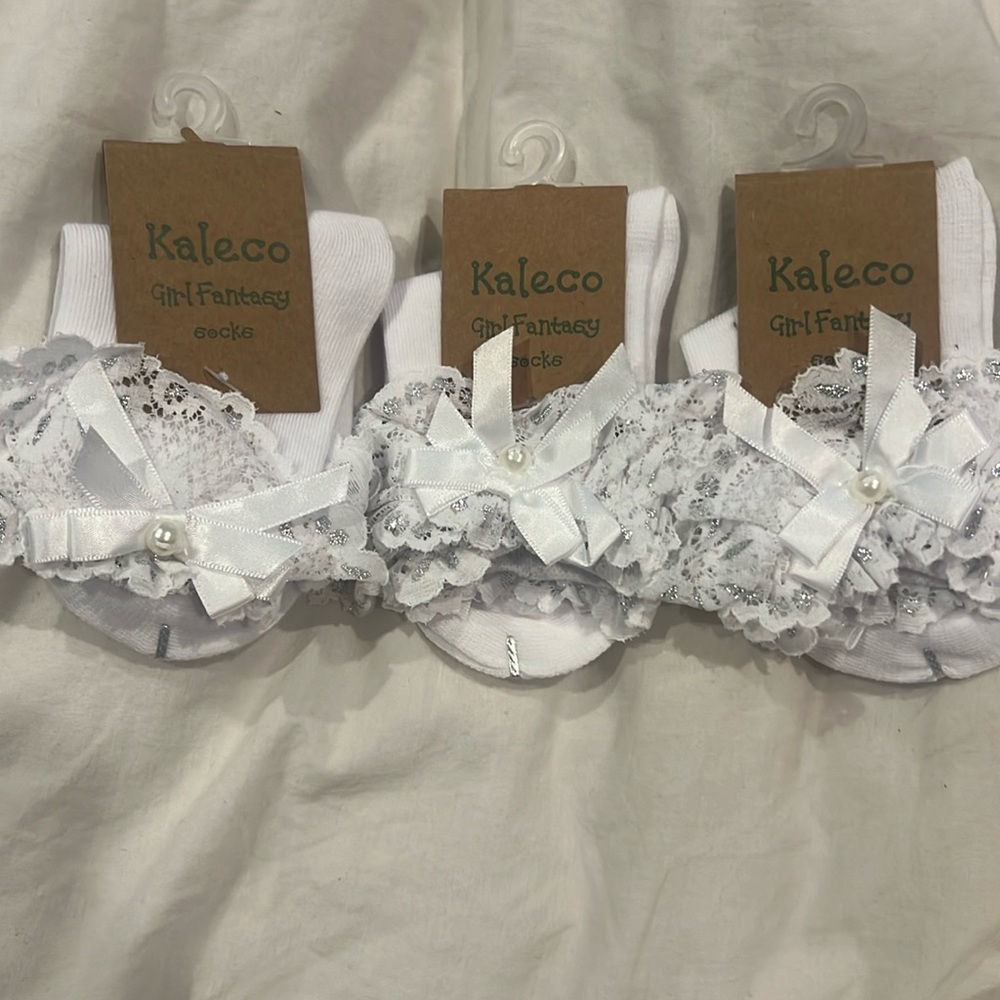 3 packs of girls small dress socks. Fit around a size 6